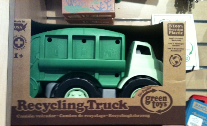Green toy truck in gift store