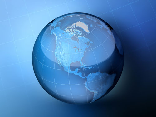 Glass globe against blue background