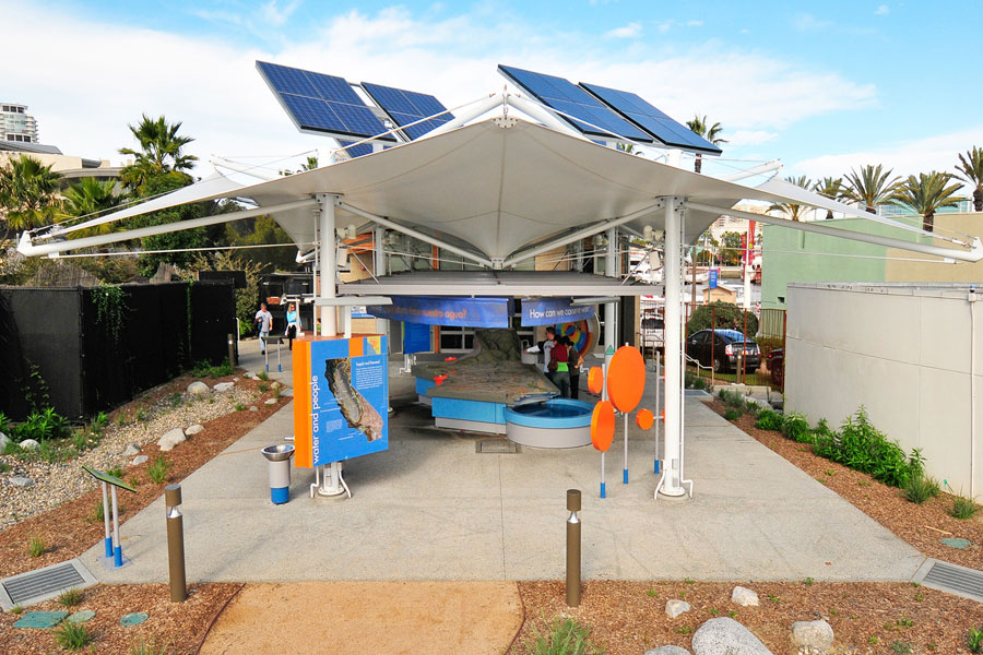 Model of southern California underneath an overhang with solar panels on top