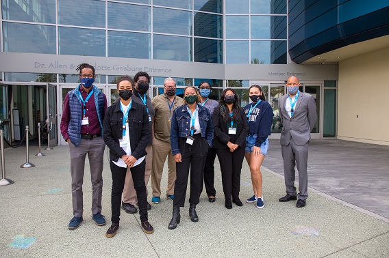 The 2021 Scholars pose with Aquarium CFO Anthony Brown (right) and President and CEO Dr. Peter Kareiva (center) during Aquarium's first African American Scholar Symposium.