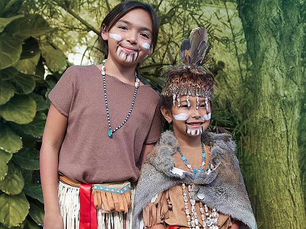 two young American Indian girls in traditional dress