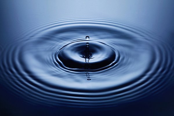 water droplet creating ripples