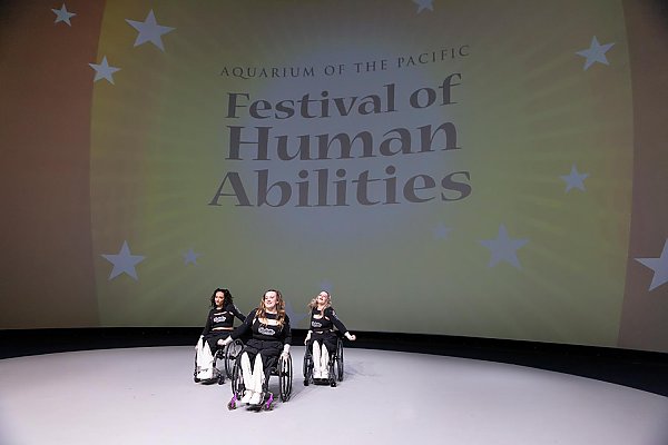 Rolletes on stage at the Aquarium of the Pacific Festival of Human Abilities