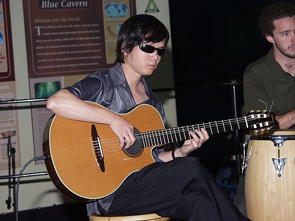 Dat Nguyen playing guitar