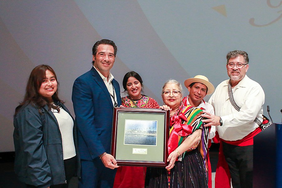 Six people holding up award for Baja Splash