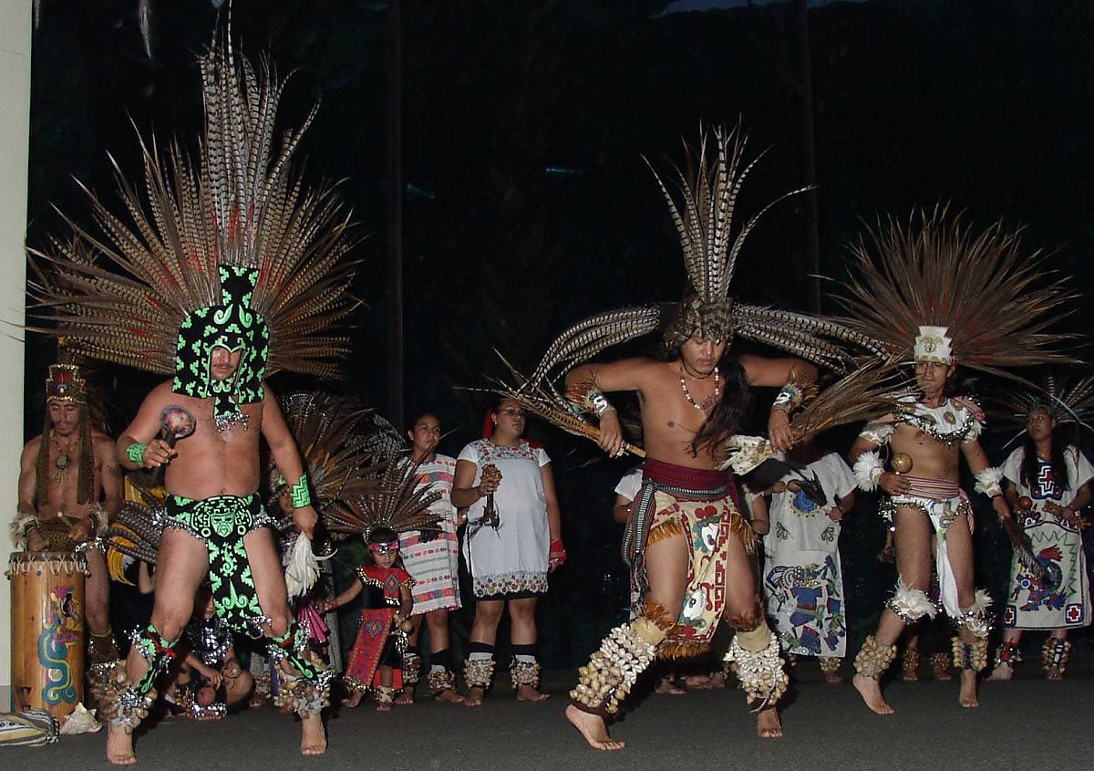 Aztec dancers performing in front of Blue Cavern