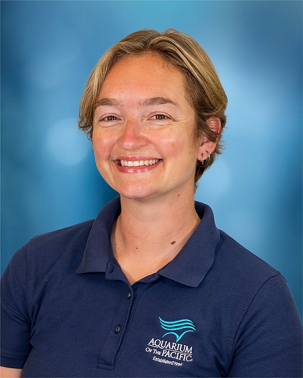Cassandra Davis portrait with blue background