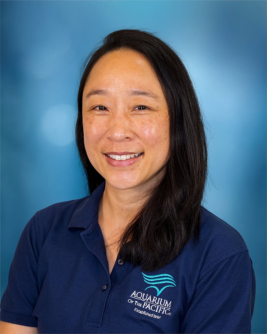 Staci Wong portrait with blue background