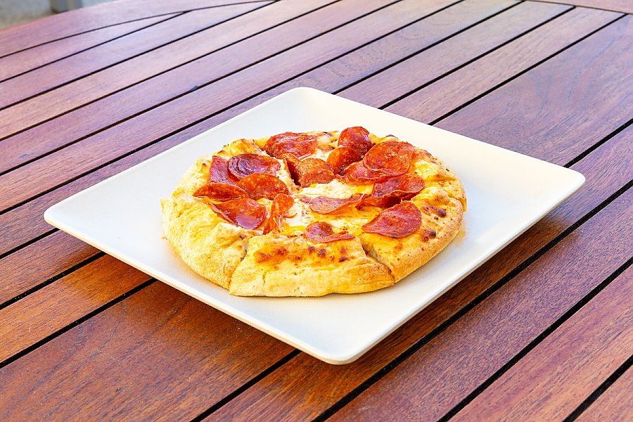 personal pepperoni pizza on a plate