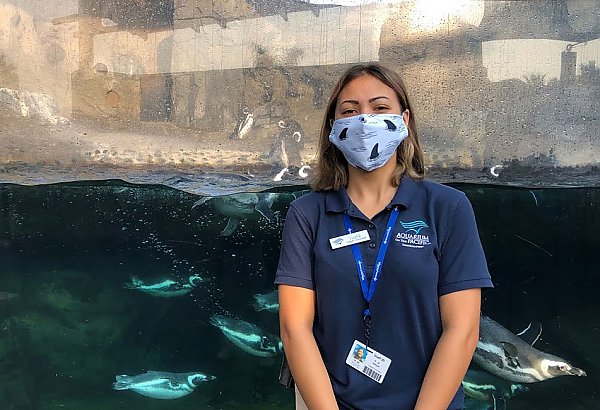 Masked woman in Aquarium uniform