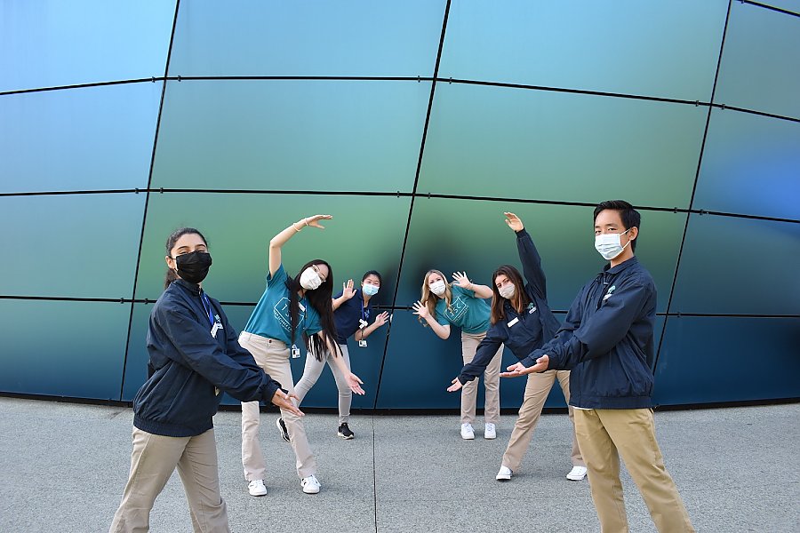 Six Teen Science Cafe volunteers in a welcoming fun pose