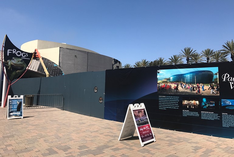Construction fence surrounding the Pacific Visions site
