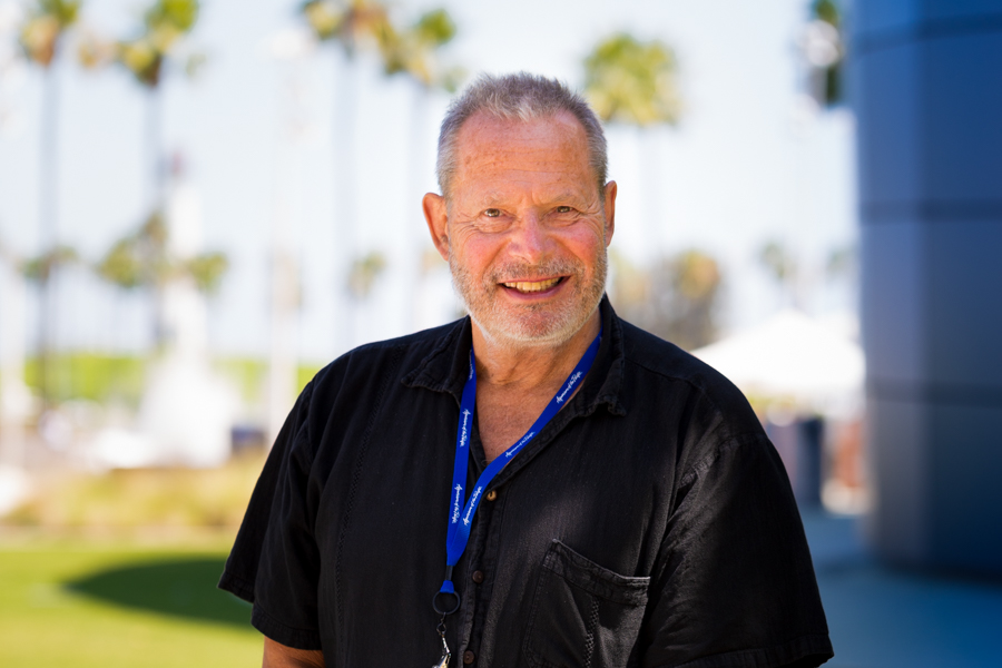 Peter Kareiva portrait with Pacific Visions in background